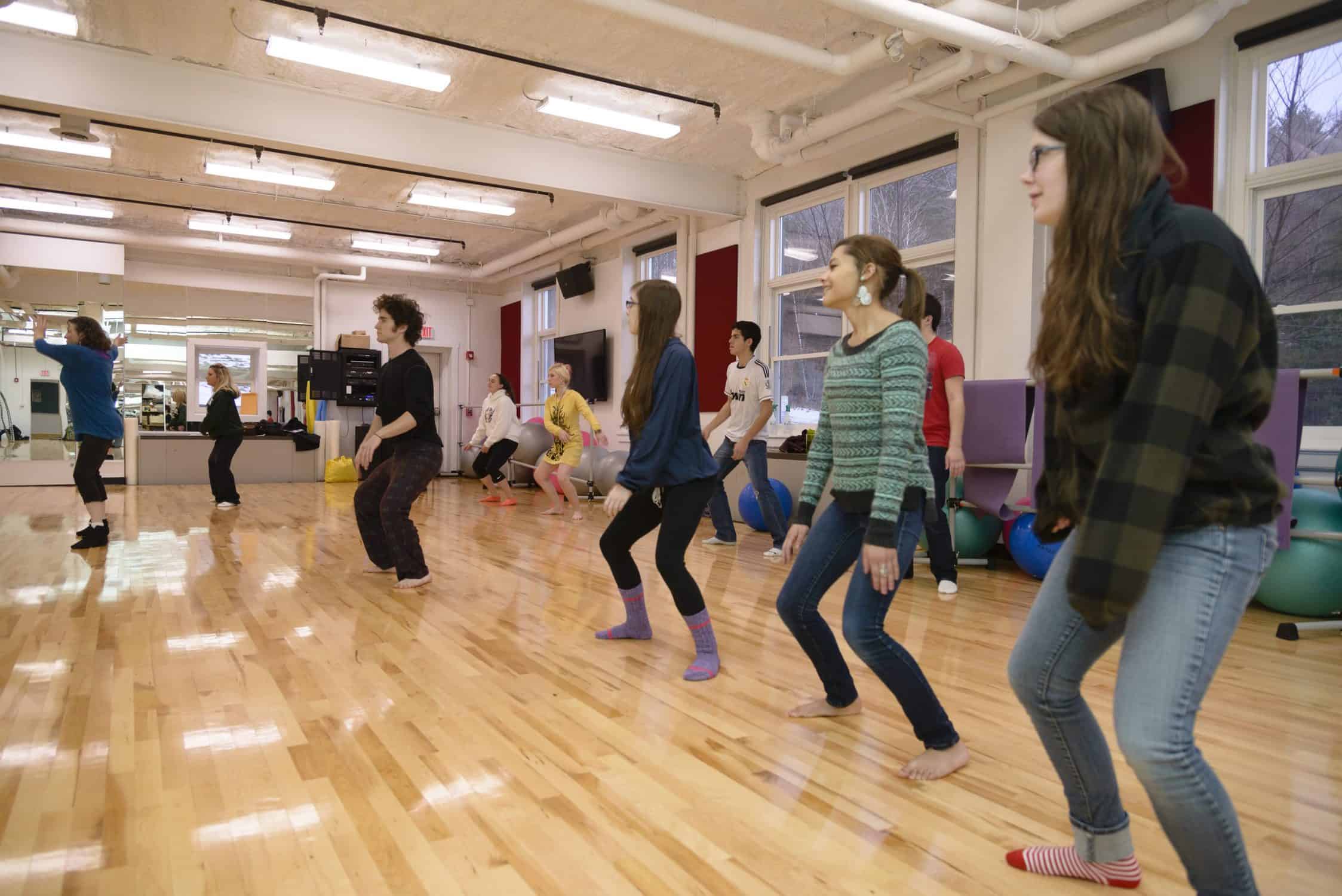 Students dance in the dance studio
