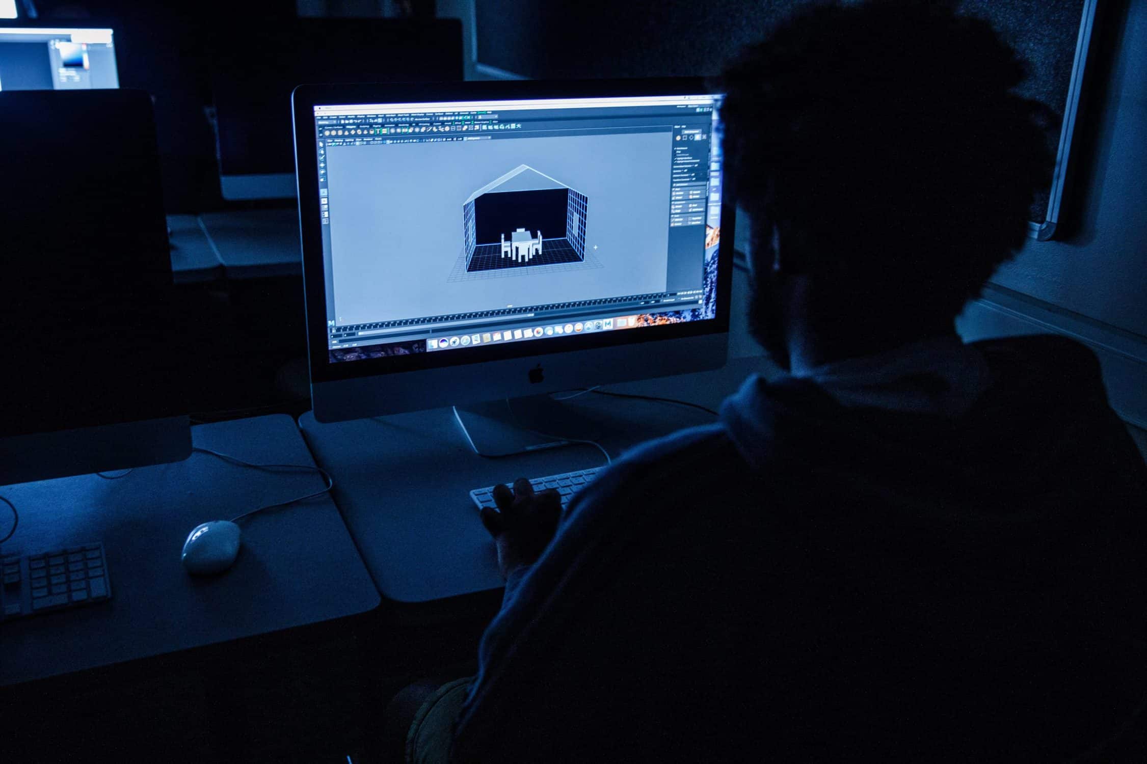 Student working on a 3D model on his computer