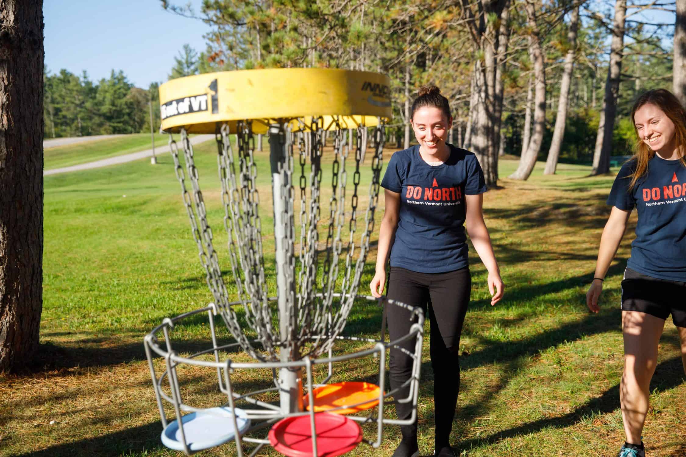 Students play disc golf