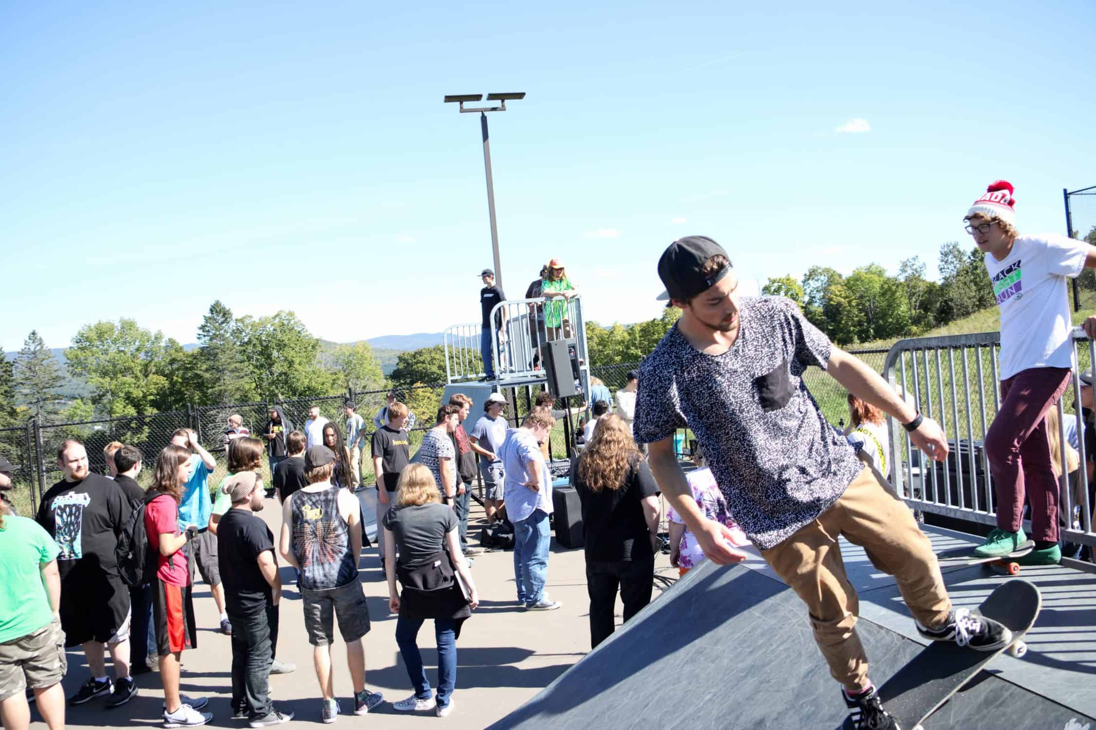 Group of students gather at the skate park