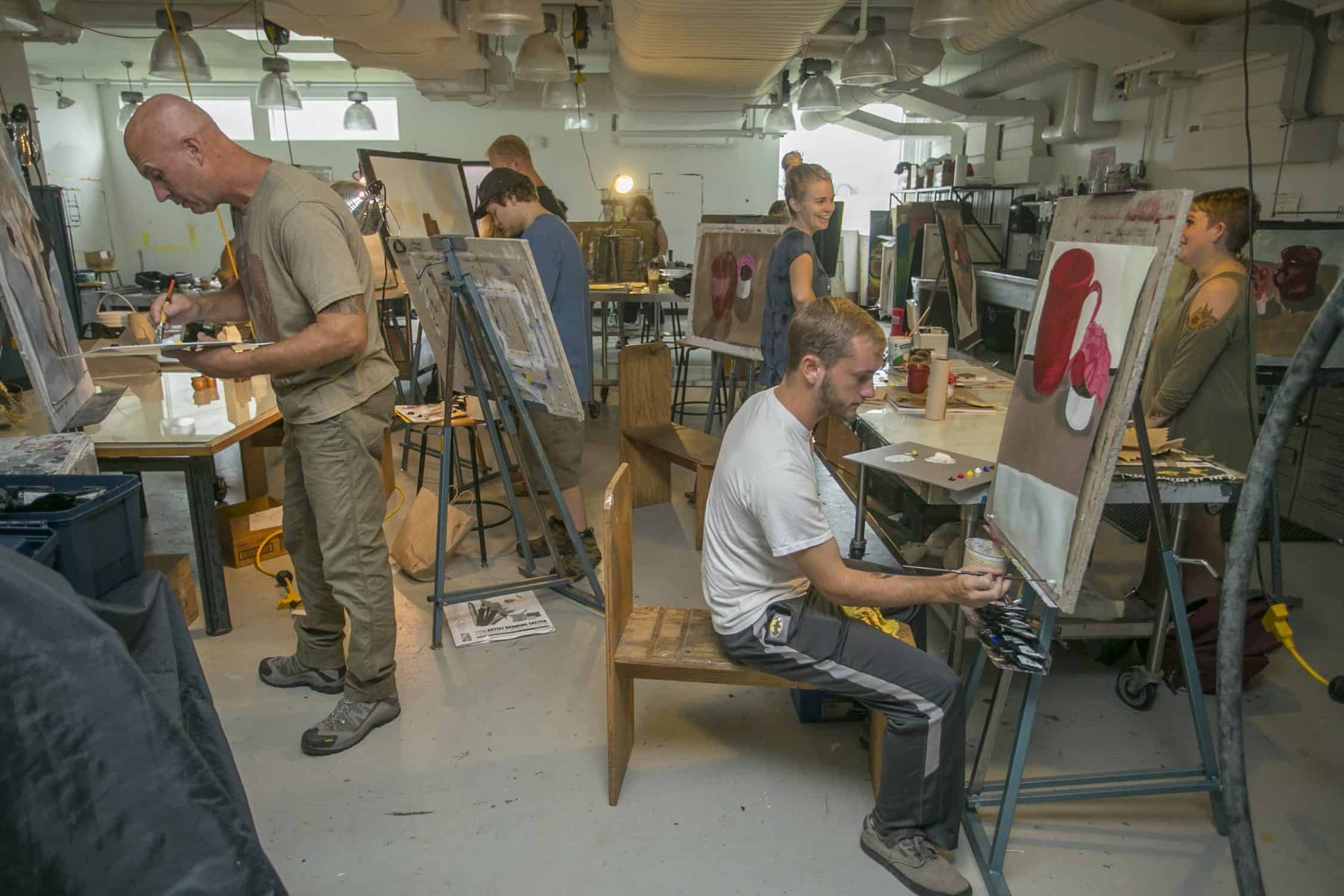 Students paint in art studio