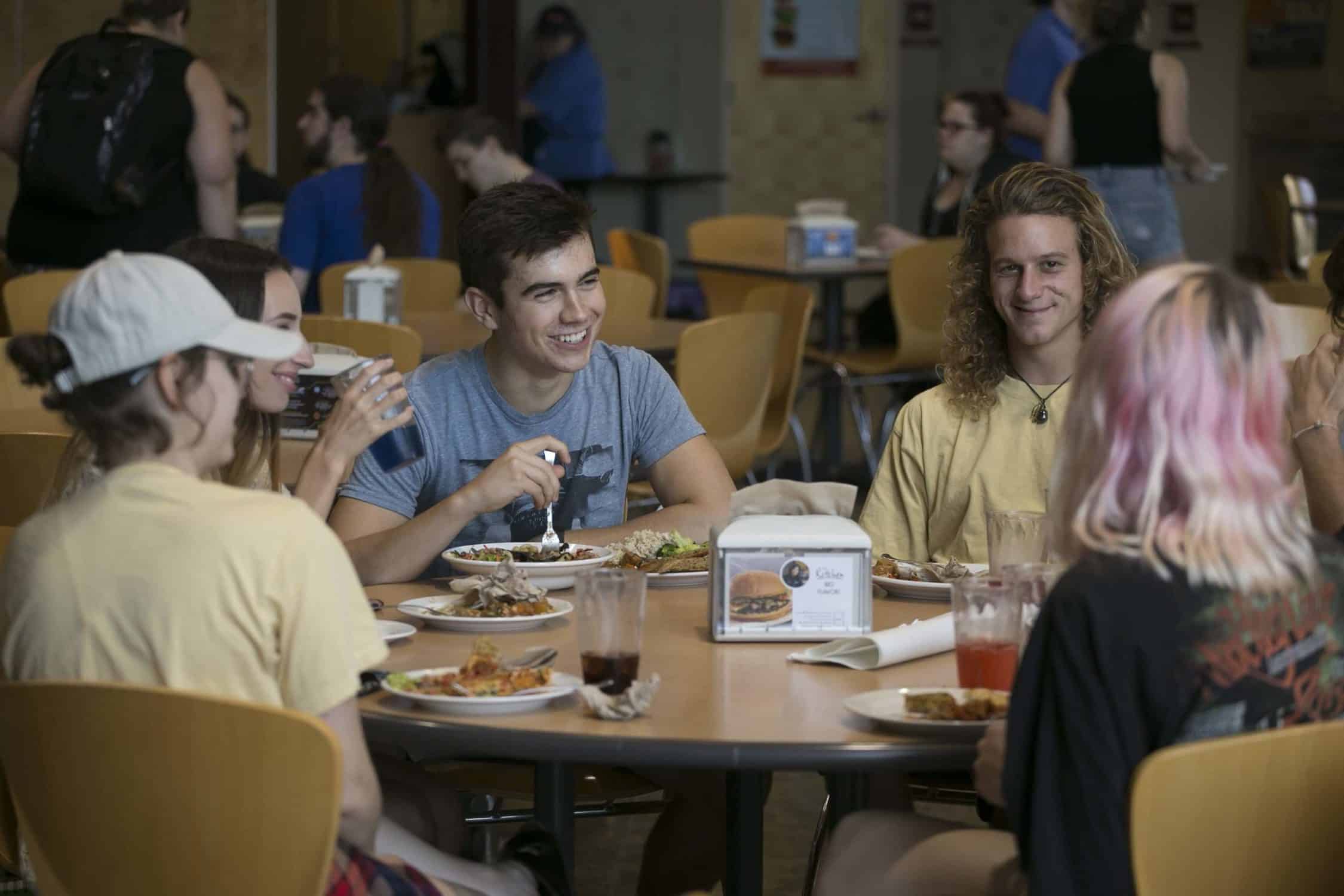 Students eat together in the dining hall